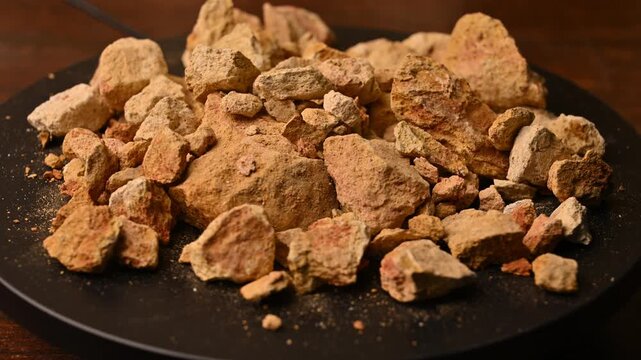 Side View of Multani Mitti (Fuller&rsquo;s Earth) Rotating on Black Background &ndash; Beauty And Skincare Rotating Footage