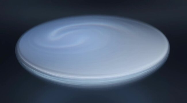 White Plate on Dark Background Rotating Slowly.