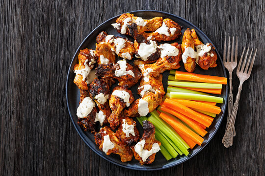 alabama white sauce chicken wings with vegetables