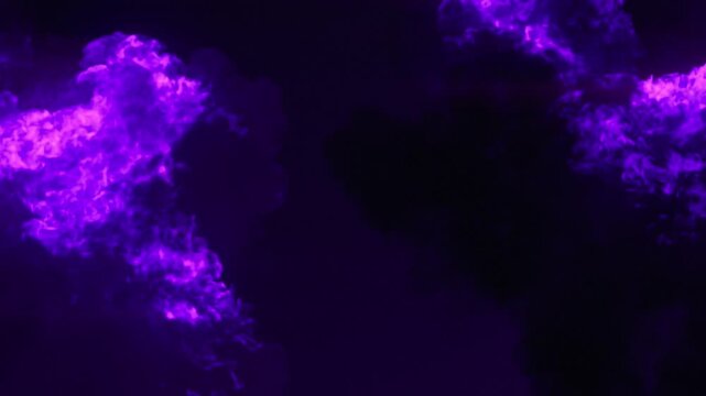 Double purple explosion on a black background. Large-scale, 3D visual effects simulation of bright magenta flames and thick smoke. Realistic footage for film production and creating magical effects