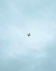 airplane flying in the blue sky