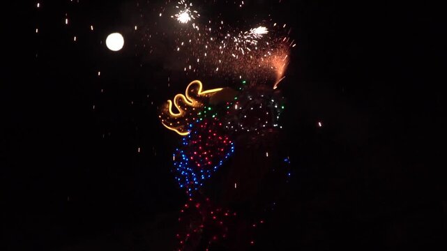 Chinese dragon performing at night.