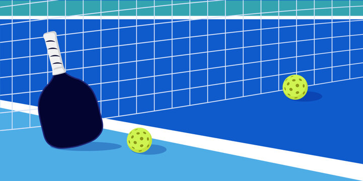 Pickleball court with paddle and balls