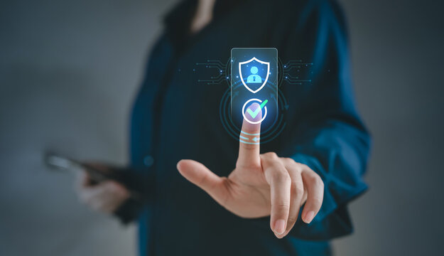 personal data privacy consent and account security concept, Person hand touching virtual user shield and check mark icon, Data protection Cybersecurity Regulatory compliance PDPA Identity verification
