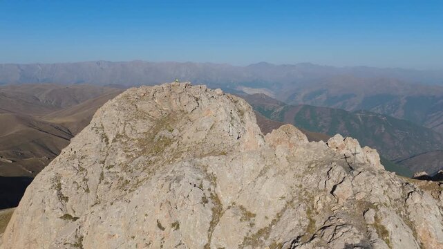 Aerial view Mount Khustup in Syunik province, Armenia, West Asia. Rocky trails in scenic mountain landscape. Touristic place. Hiking trail. Adventure travel. The height of the mountain is 3,206 meters