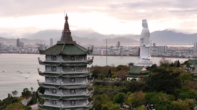 Aerial view of linh ung pagoda and lady buddha statue overlooking da nang city in vietnam