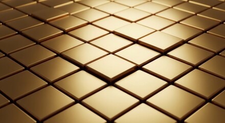 Fototapeta premium Close-up of a grid of gold squares, lit from above, creating a textured geometric pattern
