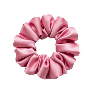 A pink satin scrunchie on a white background isolated on transparent background