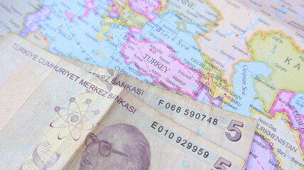 Naklejka premium Turkish Lira Currency with World Map: Travel Planning