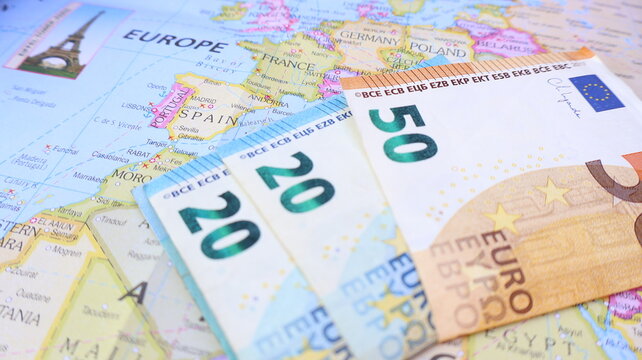 Euro Currency on Europe Map - Travel Planning Concept