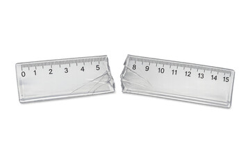 Broken plastic ruler showing failure and destruction concept