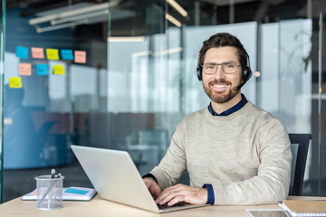 Man smiling helping customers telemarketing call center support