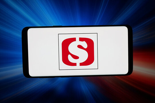 Stuttgart, Germany - 02-27-2026: In this photo illustration, the logo of retail company Shoprite Holdings Ltd. is displayed on a smartphone in front of abstract background on computer screen.