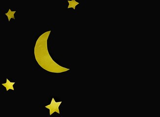 Paper crescent moon and stars on black background