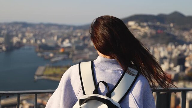 Nagasaki panorama, Japan, beautiful aerial view, with city skyline, port and mountains, seen from Nabekammuri mount, in a spring sunny day with a blue sky, Nagasaki prefecture, Kyushu island region