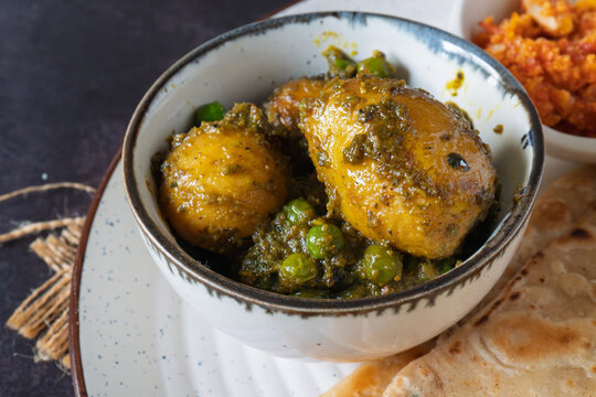 Sobuj Aloor Dum | Bengali Green Masala Potato Curry | Spiced Dum Aloo with Fresh Herb Gravy | Traditional Indian Vegetarian Potato Dish Served in Bowl
