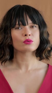 Charming Female Muse Emitting Tender Affection. Graceful Woman In Red Dress Sharing Soulful Moment. Refined Female Figure Expressing Longing With Affectionate Gaze And Gentle Movements
