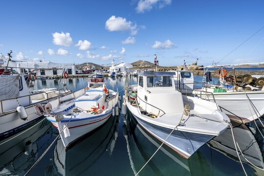 Fishing boats in Naoussa harbour, White Cycladic houses, Naoussa, Paros, Cyclades, Greece