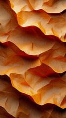 Naklejka premium Abstract warm texture with deep creases and glowing orange and red highlights, evoking sense of crumpled paper or arid terrain under dramatic light, creating visually rich and textured surface with or