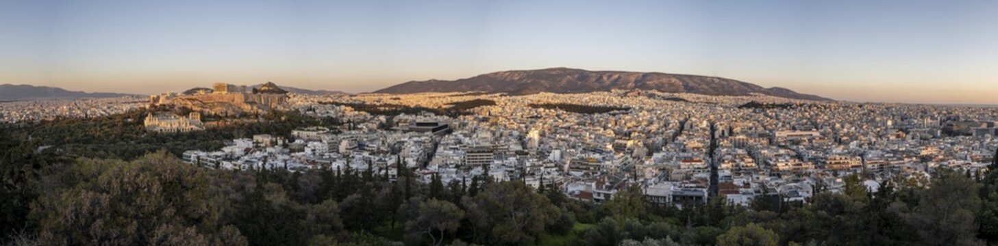 PanoramaView from Philopappos Hill over the city at sunset, panoramic view of the Parthenon Temple and Herod's Amphitheatre, Acropolis, Athens, Greece