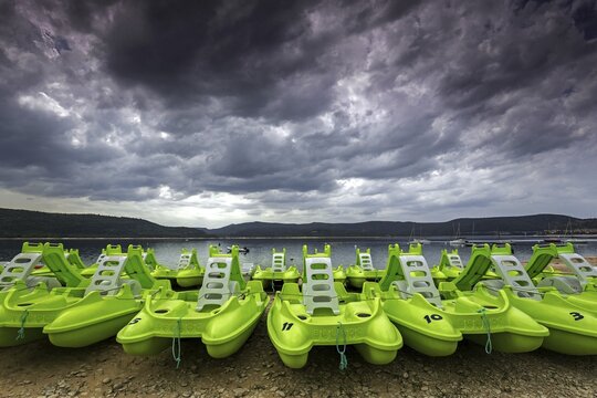 Pedal boats on the beach in Sainte Croix du Verdon, Lac de Sainte-Croix, thunderstorm atmosphere, Provence-Alpes-C&ocirc;te d'Azur, Provence, France