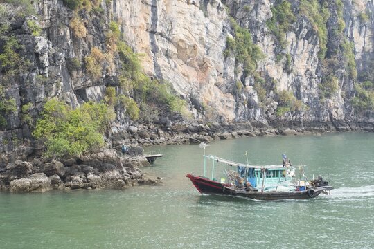 Fishing boat in Halong Bay, Gulf of Tonkin, Vietnam