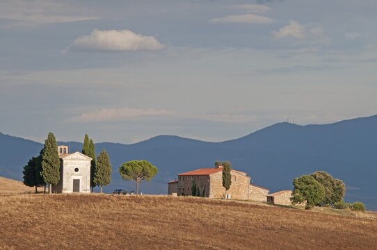 Landscape in Tuscany with chapel and farmstead, Italy