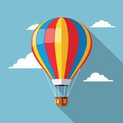 Fototapeta premium A brightly colored hot air balloon ascends against a blue sky, accompanied by fluffy white clouds and a long shadow
