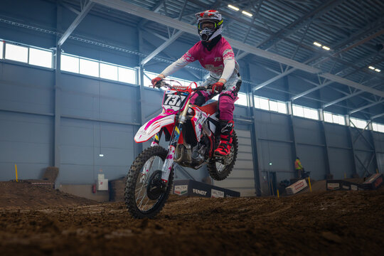 Latvia, Riga August 27, 2025,  regular training Motorcycle Rider Mid-Air Stunt in Indoor Arena