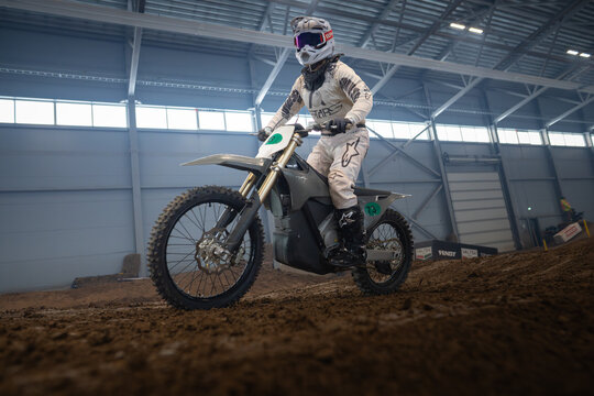 Latvia, Riga August 27, 2025,  regular training Rider on dirt bike in indoor arena