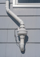 radon mitigation installed system outside the house