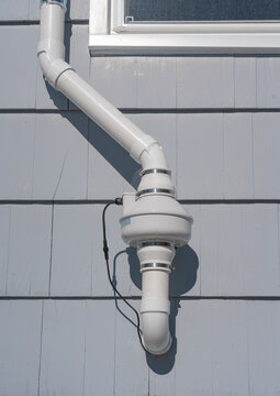 radon mitigation installed system outside the house