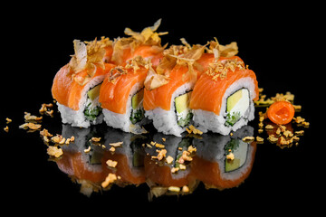 Fresh mouth-watering sushi with salmon and mango philadelphia cheese prepared in a Japanese restaurant. © sergo321