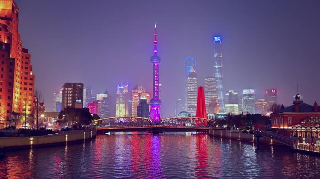Shanghai city skyline and Oriental Pearl Tower in Lujiazui district with urban traffic and New Year atmosphere, China