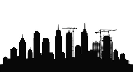 City skyline with construction cranes in a striking black silhouette