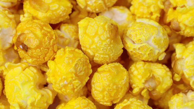 Yellow cheese popcorn circle rotation close up