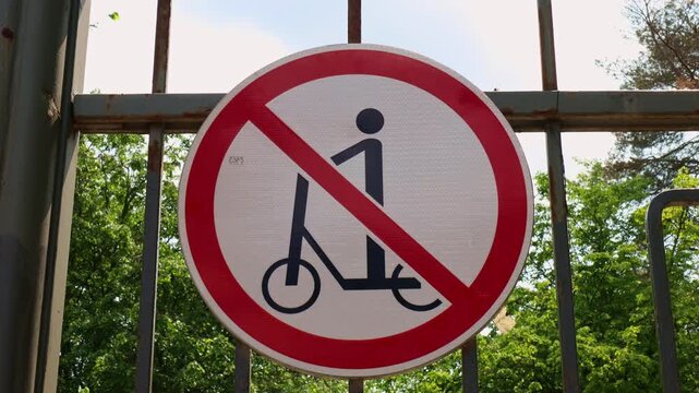 No scooters allowed. Road sign Movement on scooters is prohibited. Riding is prohibited. Safety for pedestrians
