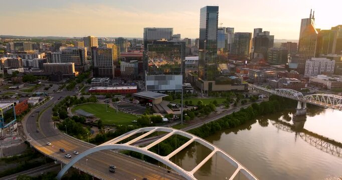 Highway traffic with driving cars on Korean Veterans Memorial Bridge in downtown district of Nashville city in Tennessee, USA.