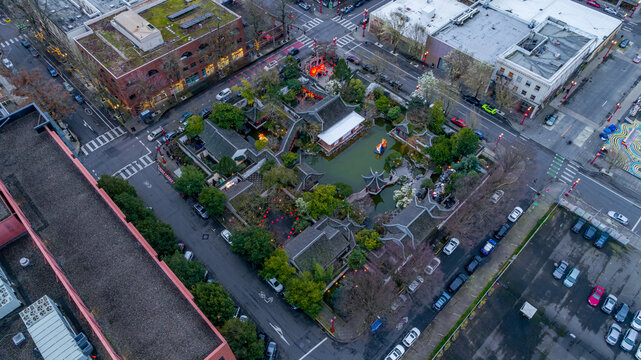 Aerial view of the exquisite Lan Su Chinese Garden, an island of tranquility amidst the urban grid, Portland, Oregon, United States.