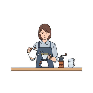 Barista making pour-over coffee with kettle and grinder on wooden counter