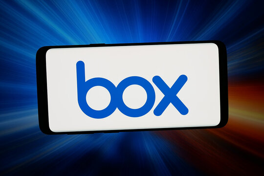 Stuttgart, Germany - 02-27-2026: In this photo illustration, the logo of US content management company Box Inc. is displayed on a smartphone in front of abstract background on computer screen.