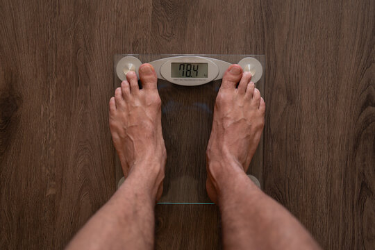 man on scales