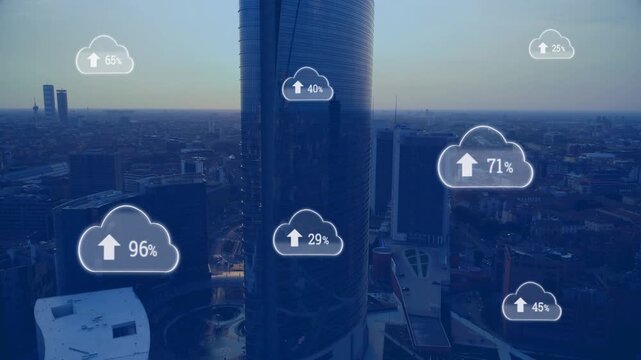 Initial cloud icons appearing over glass tower, upload icons spawning and showing progress to 100%