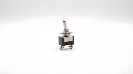 Small metal toggle switch, electronic component, isolated on white background, studio lighting