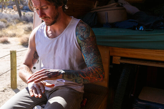 Climber taping his hands