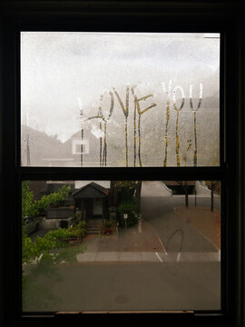 Love Note on a Fogged Window in a Quiet Neighborhood