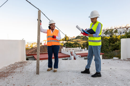 Two safety inspectors at a construction site