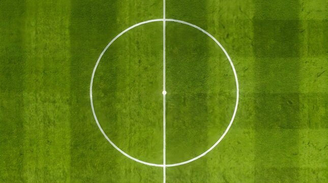 Aerial shot of a vibrant green sports field showing the crisp white center circle and halfway line.