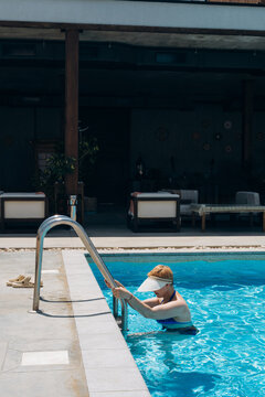 Family enjoying a day at the pool during their travels