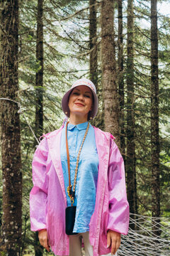 Family member enjoys outdoor time in forest during travel